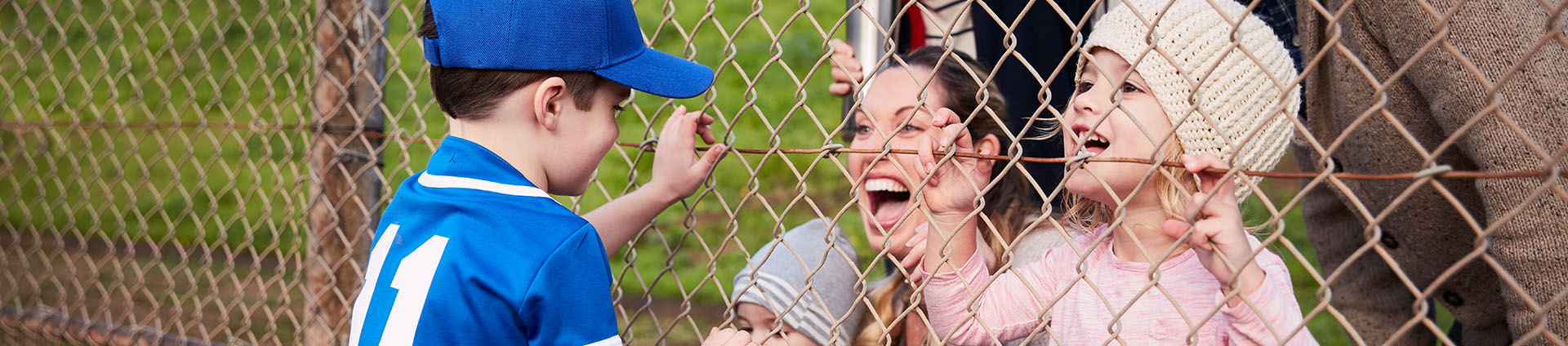 Family cheering for boy